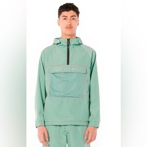 Que La Famille wind breaker in Mint Green NWT *See Description* size M